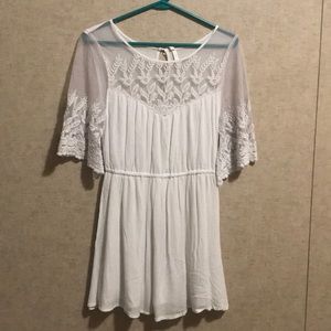 White thigh length dress